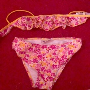 Pink and yellow two piece swimsuit